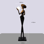 Lampadaire Femme au Chapeau