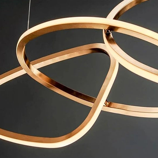 Lustre Cartier longiligne 5 cercles en doré
