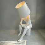 Sculpture Homme Assis – L’Homme Lumière
