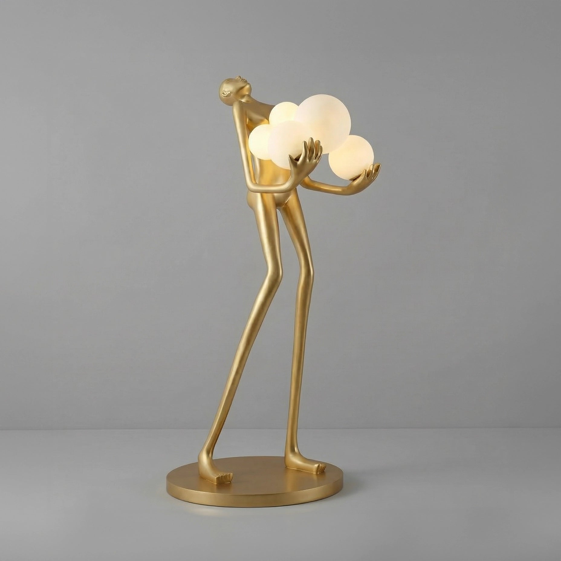 Sculpture Homme aux Six Sphères Lumineuses