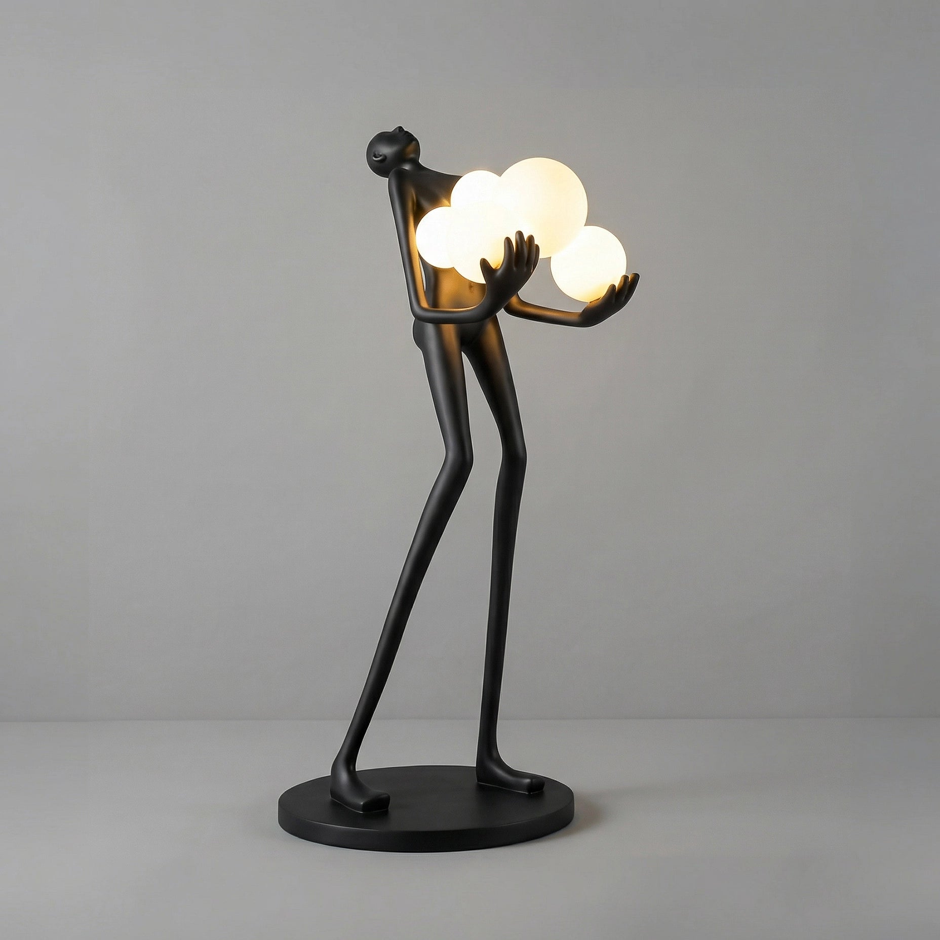 Sculpture Homme aux Six Sphères Lumineuses