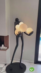 Sculpture Homme aux Six Sphères Lumineuses